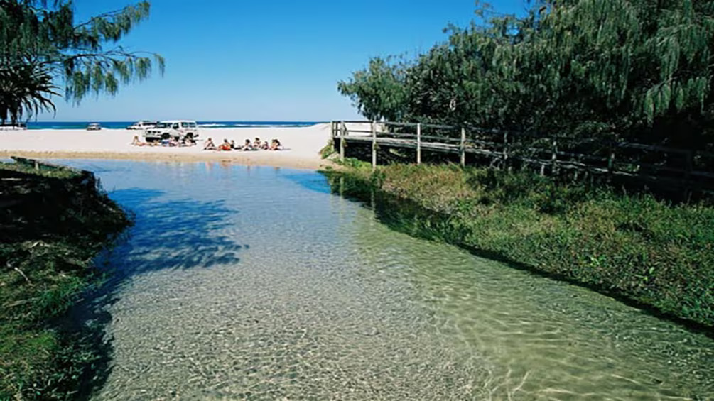 creek running to beach on Fraser Island