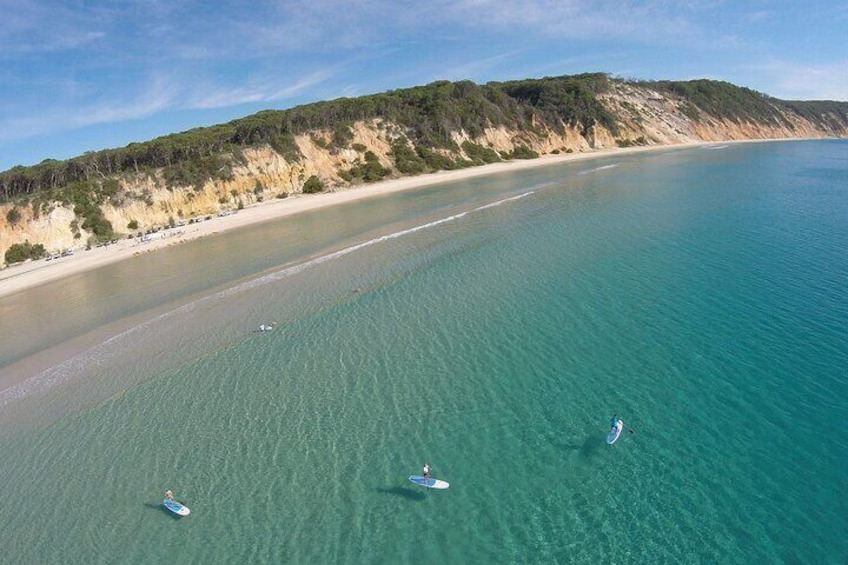 People on paddle boards off Rainbow Beach
